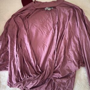 Long sleeve pink/purple top with cut out in middle never worn
